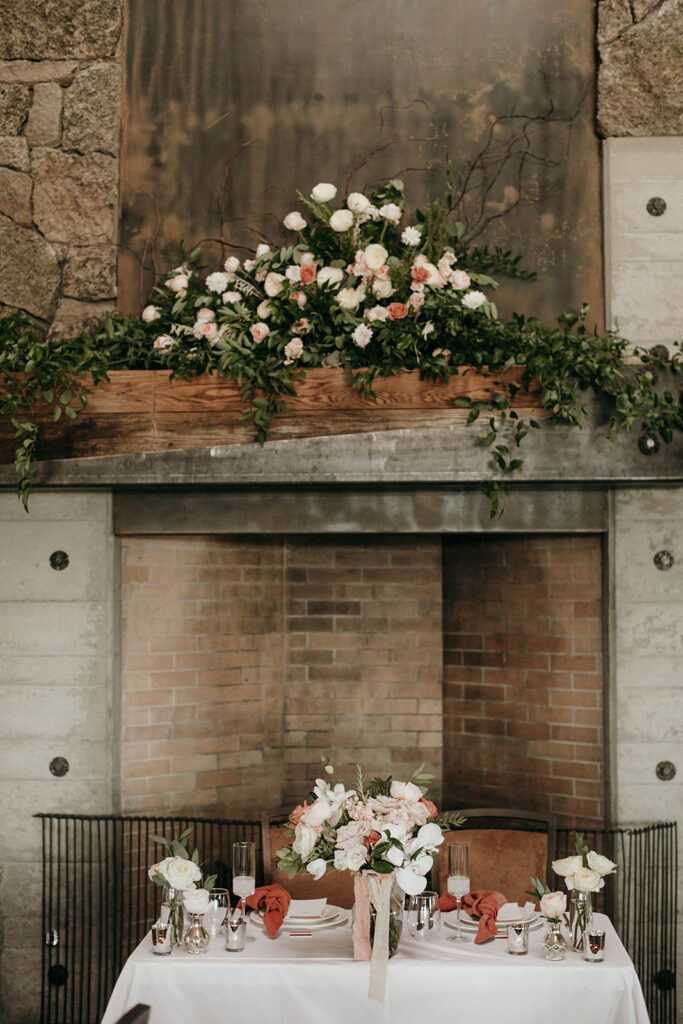 sweetheart table setup with sophisticated nude florals